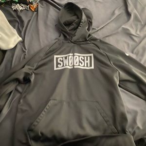Black Nike “Swoosh” sweatshirt